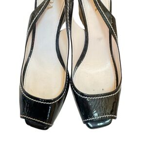 Prada Patent leather Black open toe and raffia platform with ankle strap.
